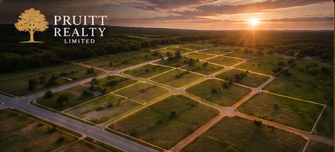 Aerial view of available land parcels at sunset